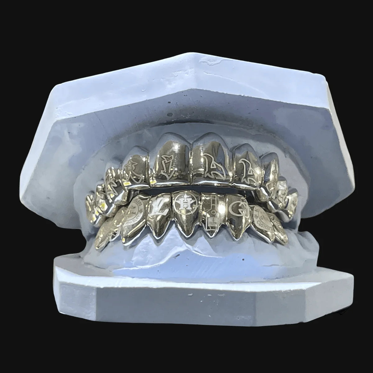 Silver Grillz ($50 a tooth)